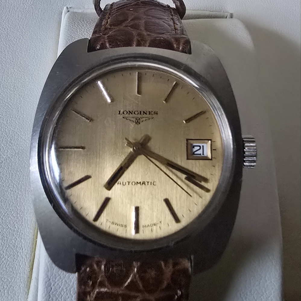Longines Gold Dial Watch with Brown Leather Strap